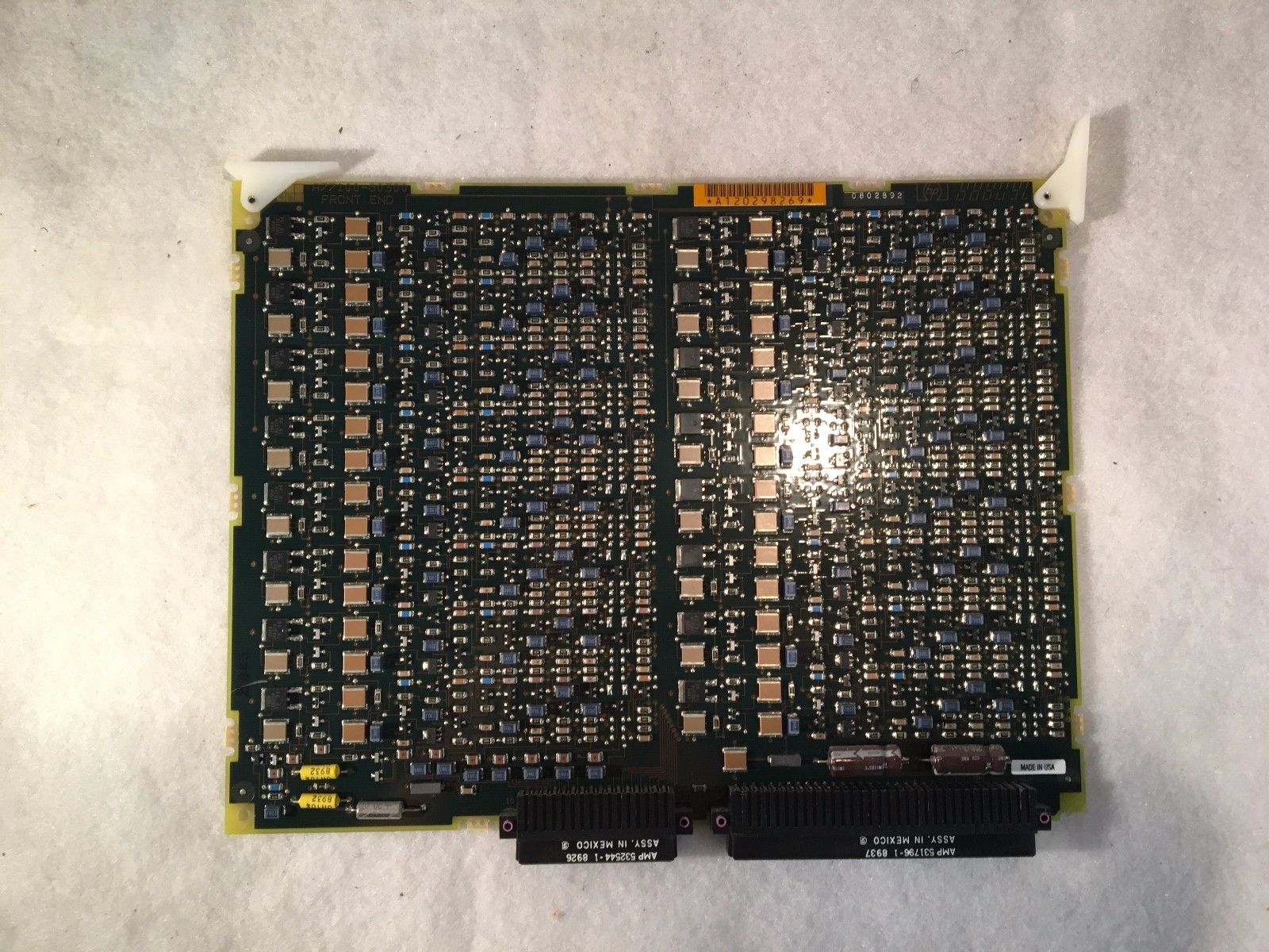 a close up of a computer chip on a white surface