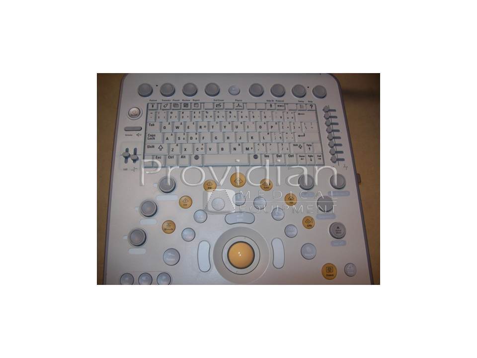 a computer keyboard sitting on top of a table