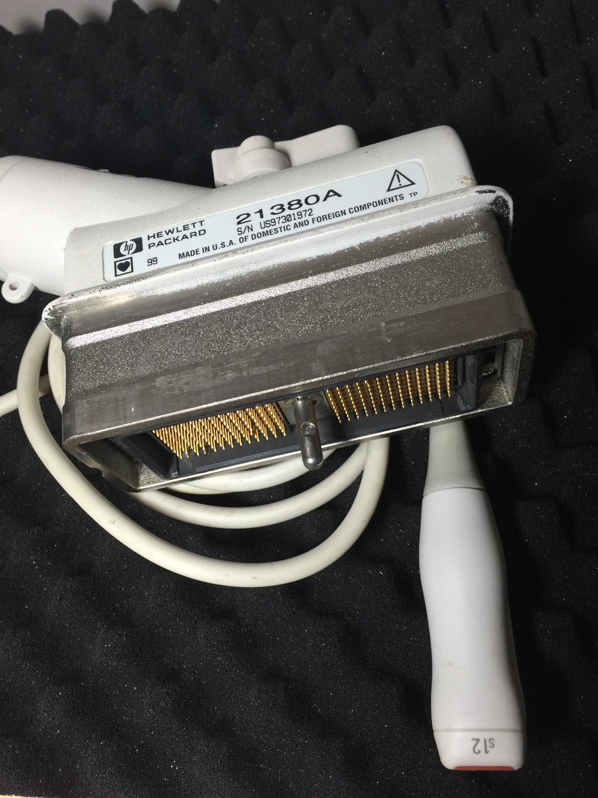 a close up of a device with a cord attached to it